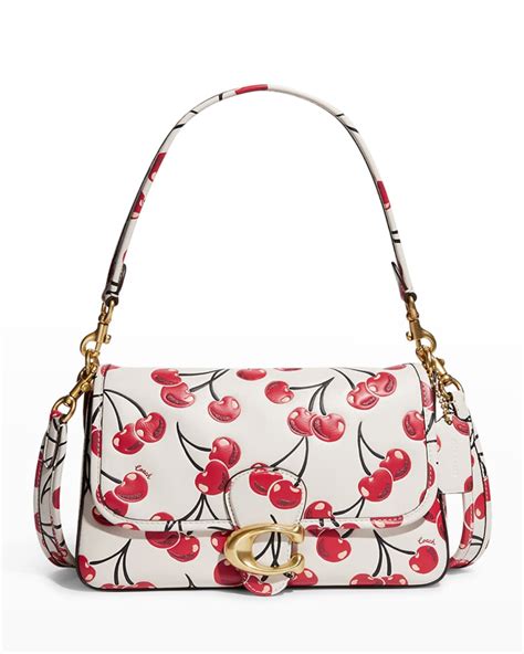 small coach bag with cherries